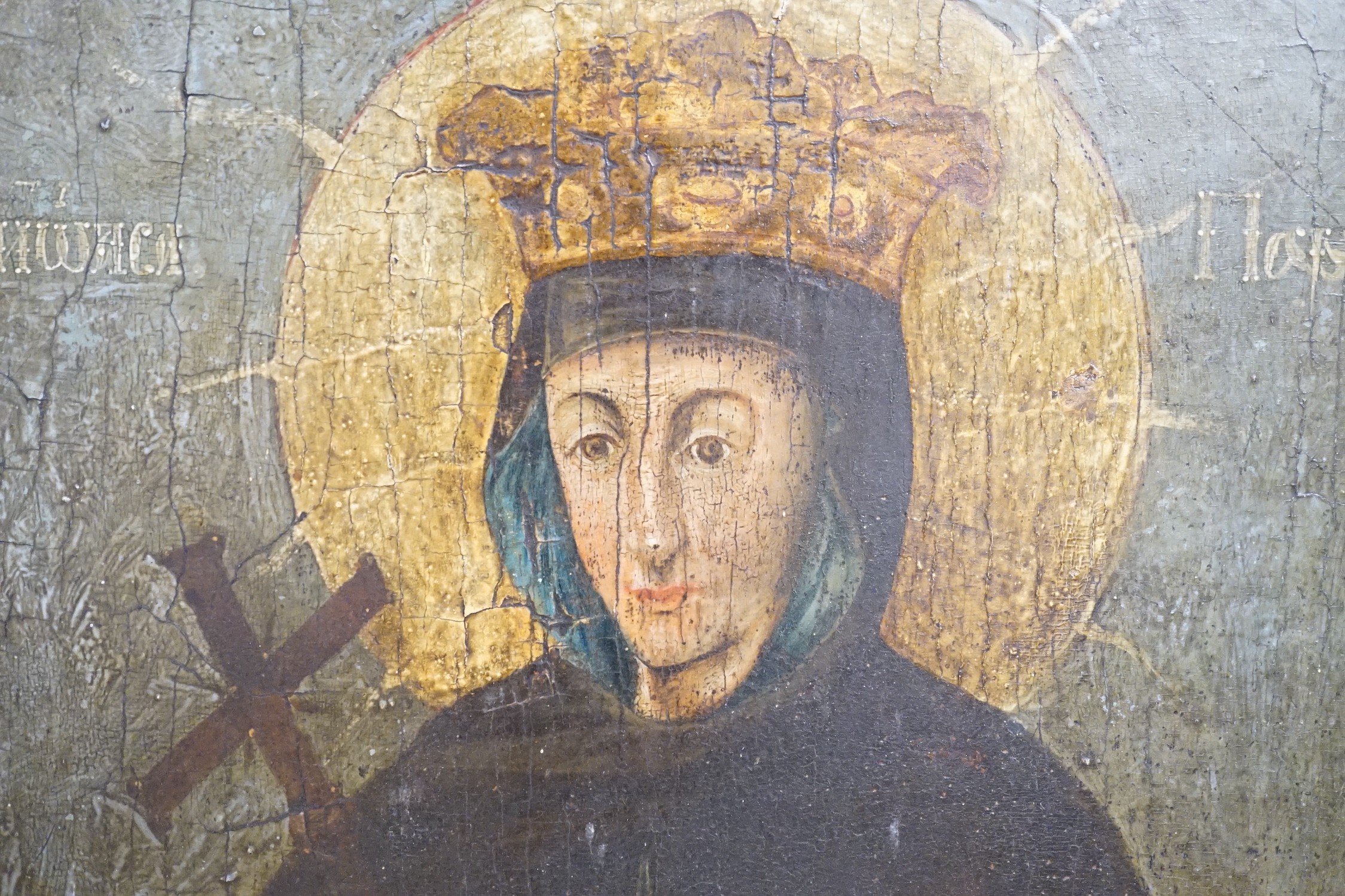 19th century Russian School, tempera on panel, Icon of a female saint, 62 x 58cm